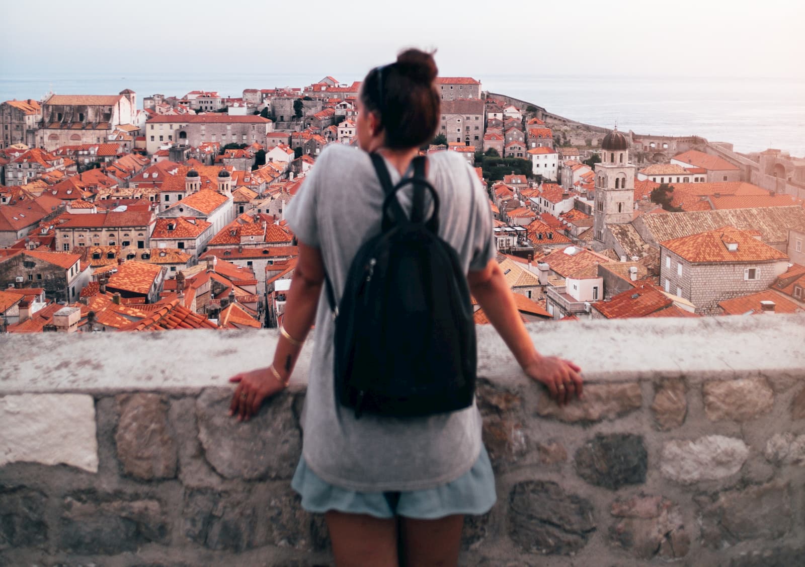 woman looking at buildings 2040627