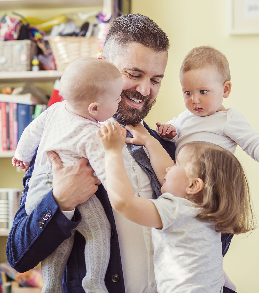 Man with three children