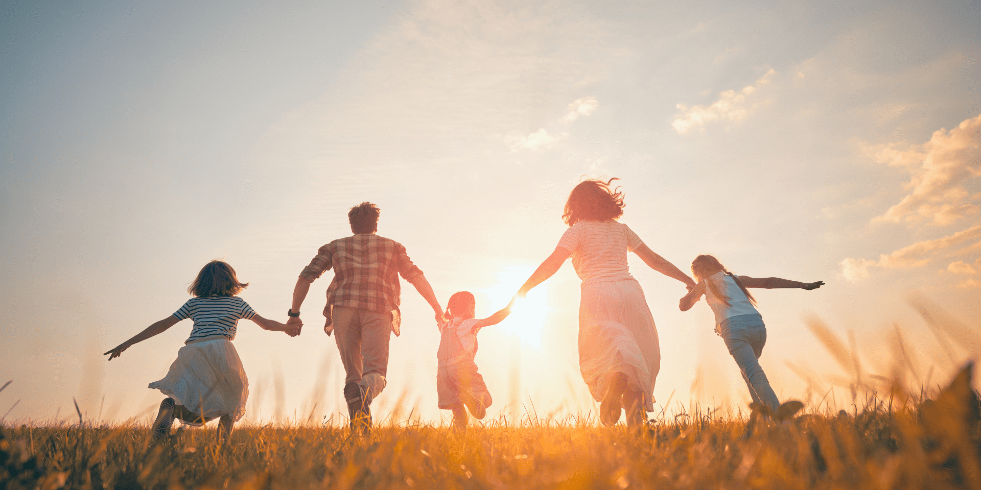 How to Choose Life Insurance. Image of family running in field