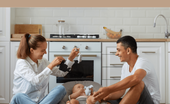 young family with baby in the kitchen