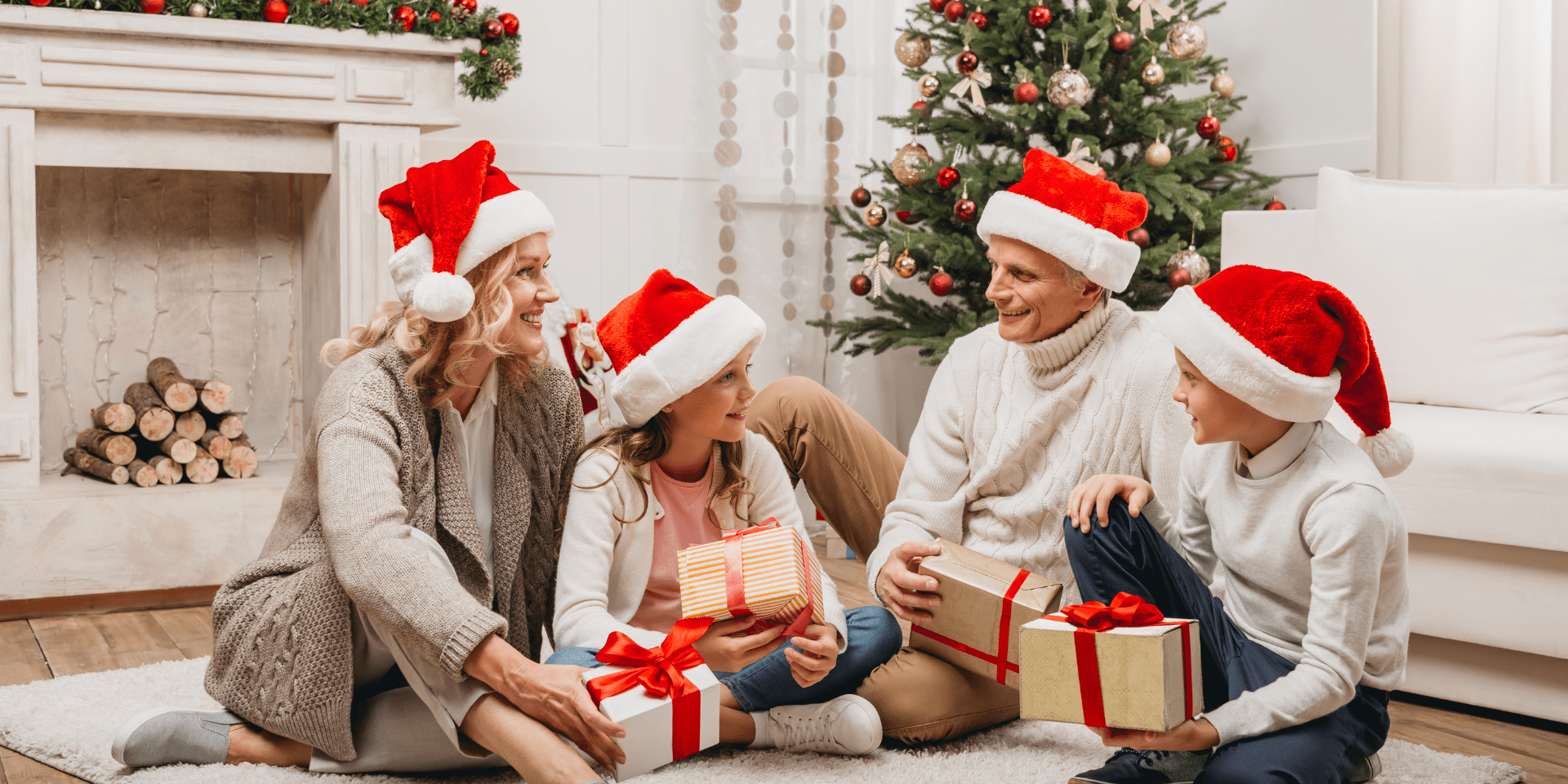 family giving Christmas presents