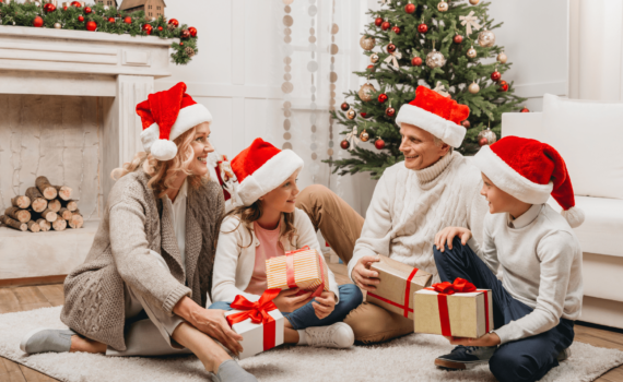 family giving Christmas presents