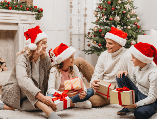 family giving Christmas presents