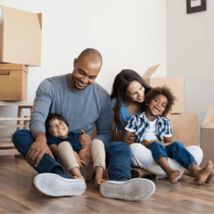 family in their house with moving boxes