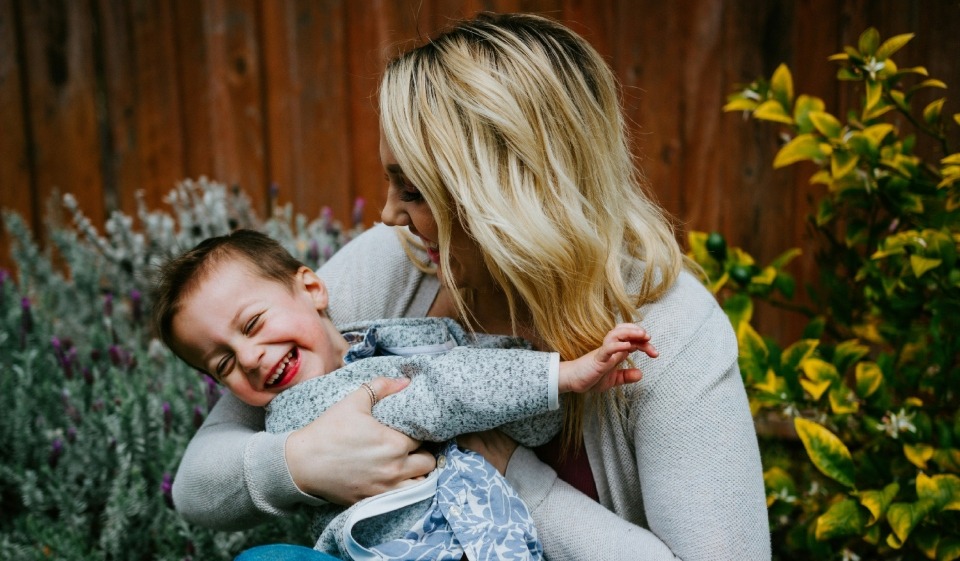 mother and son playing