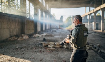 photographer at modern ruins