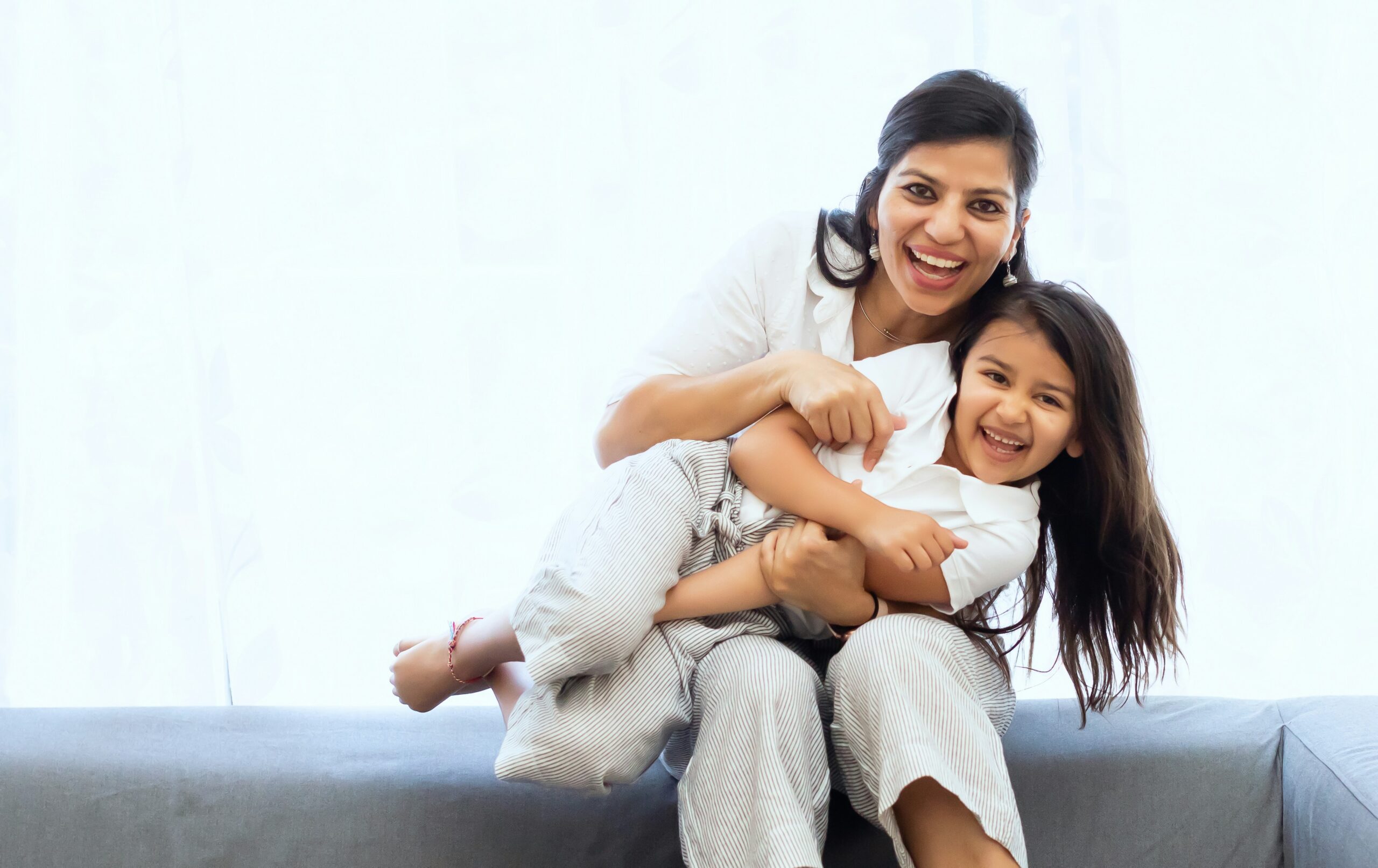 mother and daughter playing